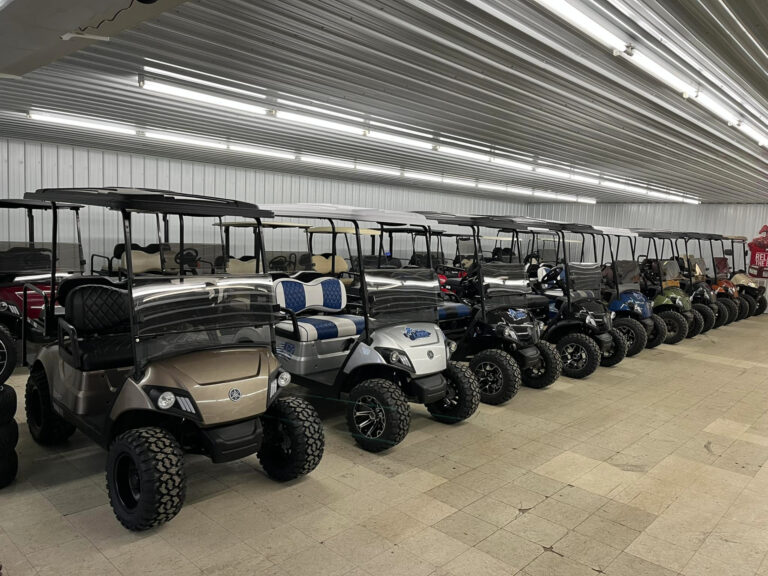 Golf carts lined up at Rocky’s Rides