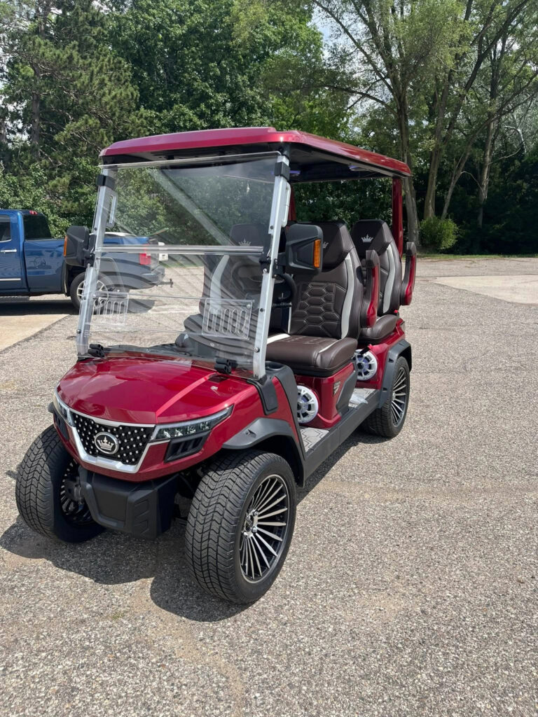 Red golf cart at Rocky’s Rides